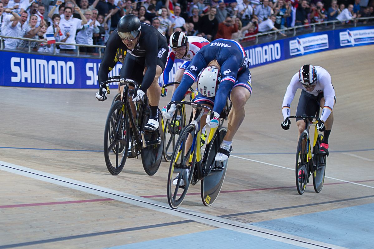 Francois Pervis throws his bike to claim the Keirin win