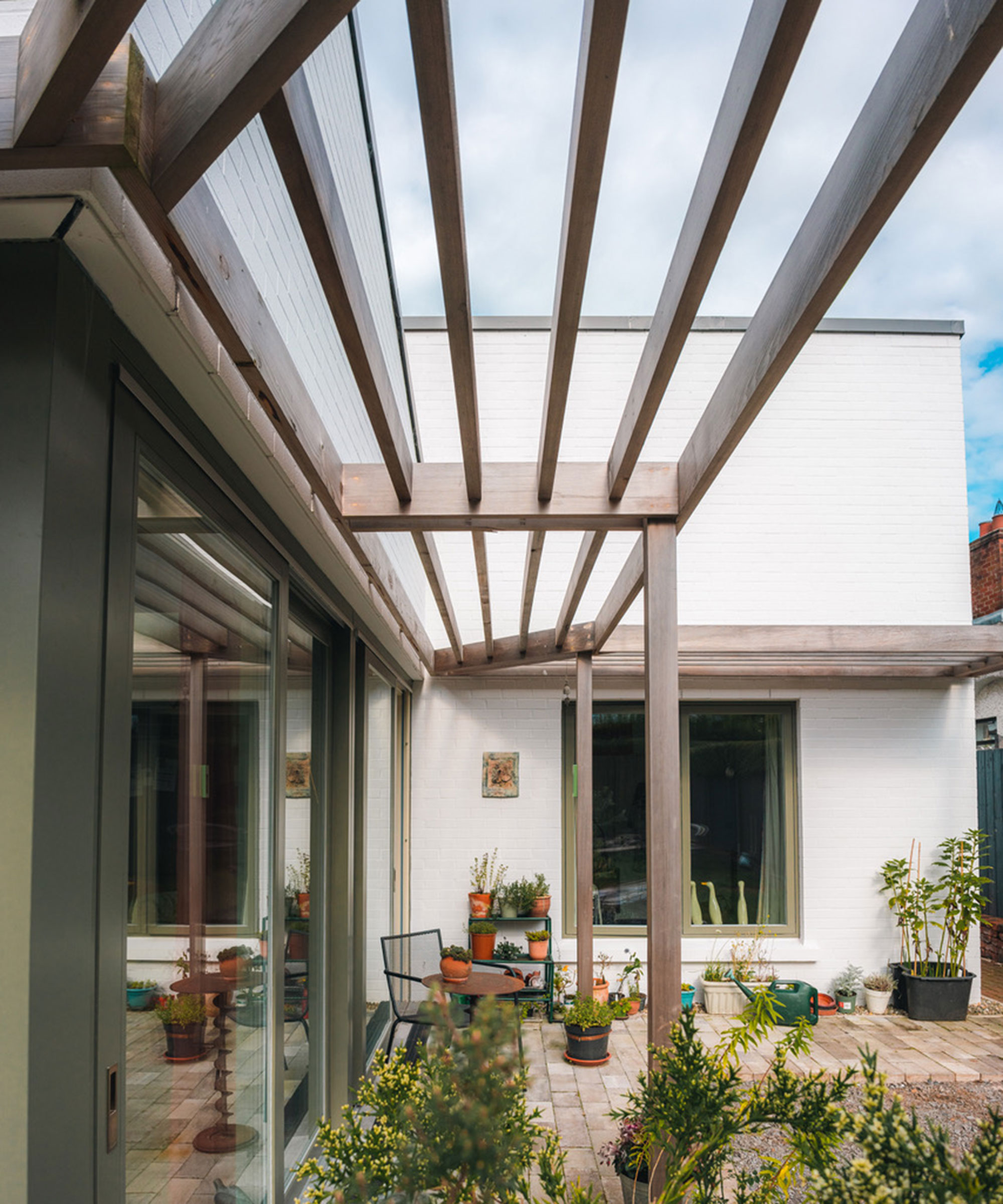 patio shaded by wooden brise soleil