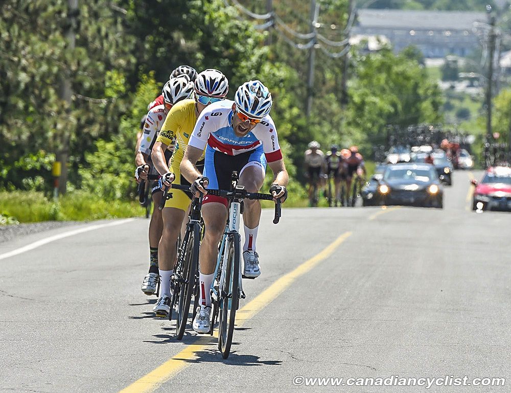 Hugo Houle (Team Canada) tries again to get away on the final climb