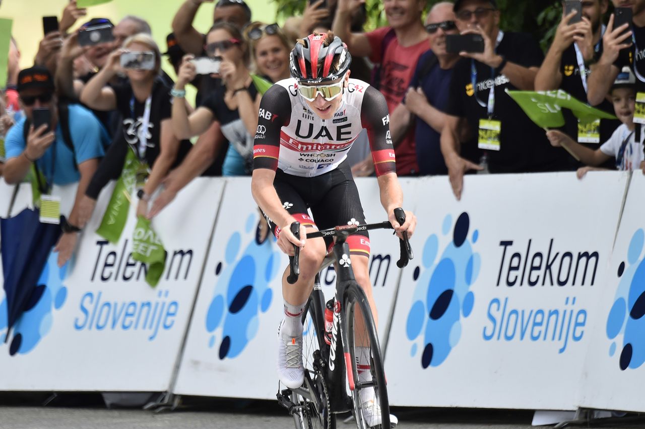 Tadej Pogacar heads to the finish alone
