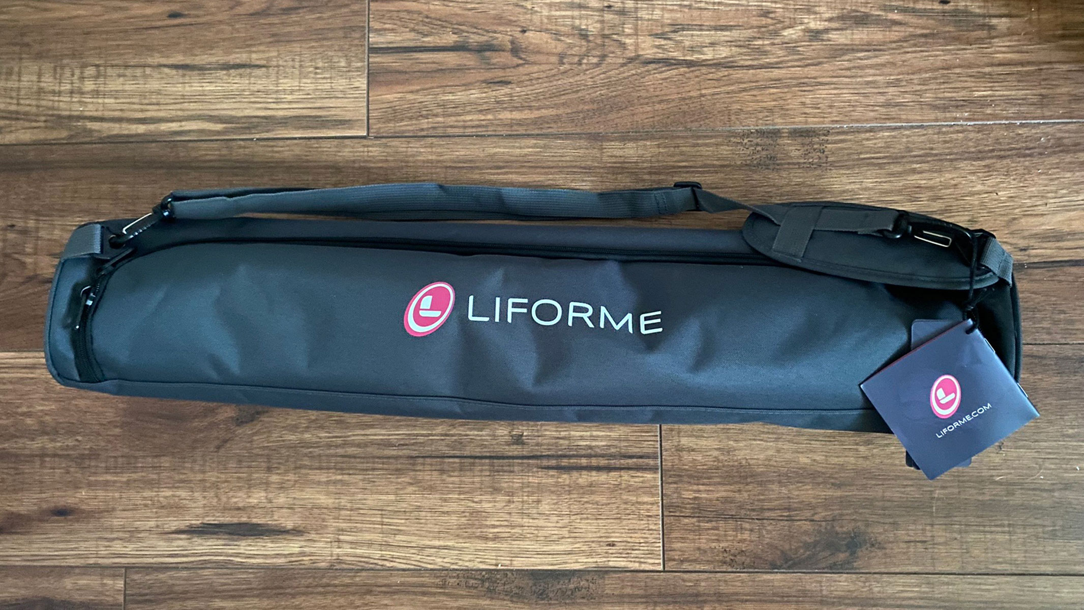 Liforme yoga mat in a carrying bag