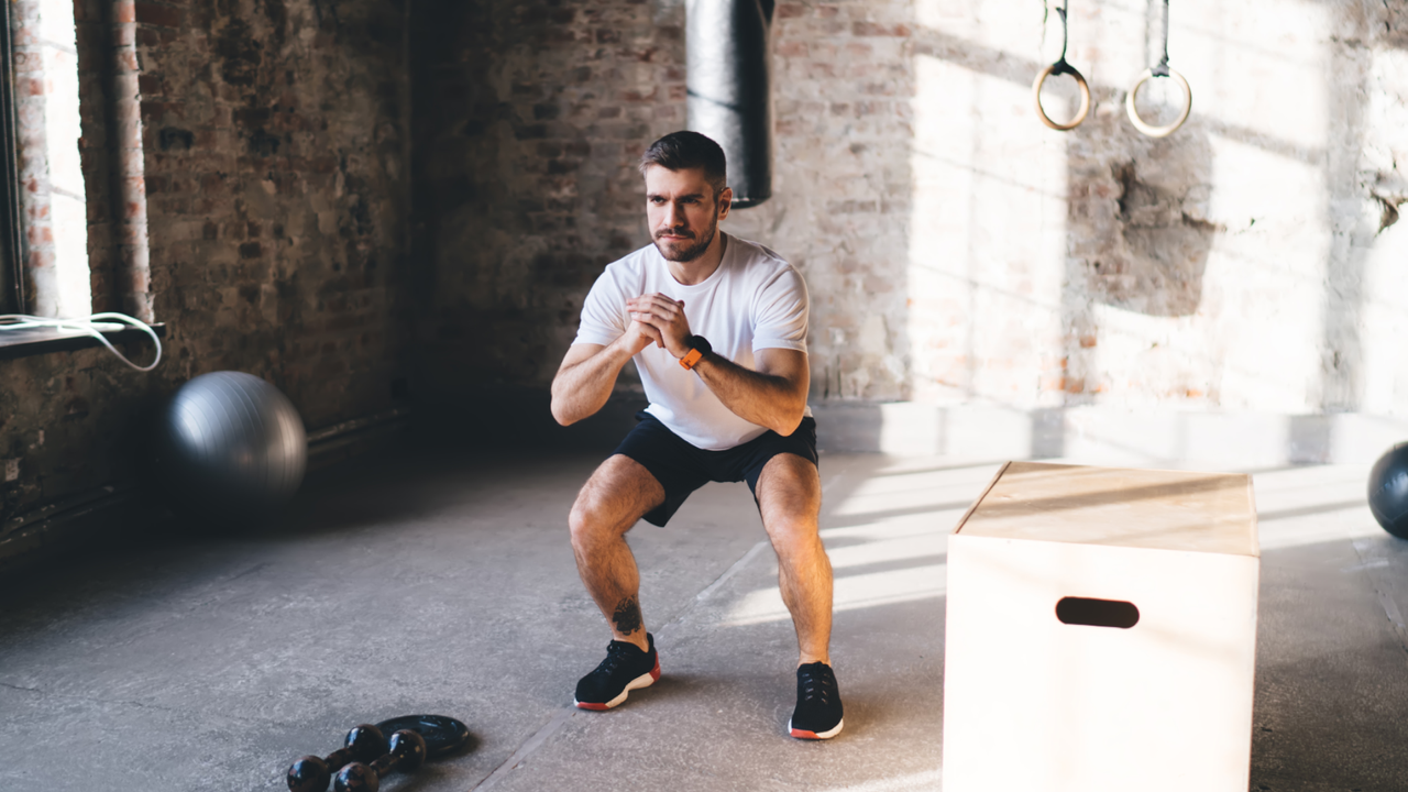 Man doing bodyweight squats