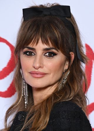 Penelope Cruz attends the "L'Immensita" photocall at Cinema Pathe Beaugrenelleon December 13, 2022 in Paris, France