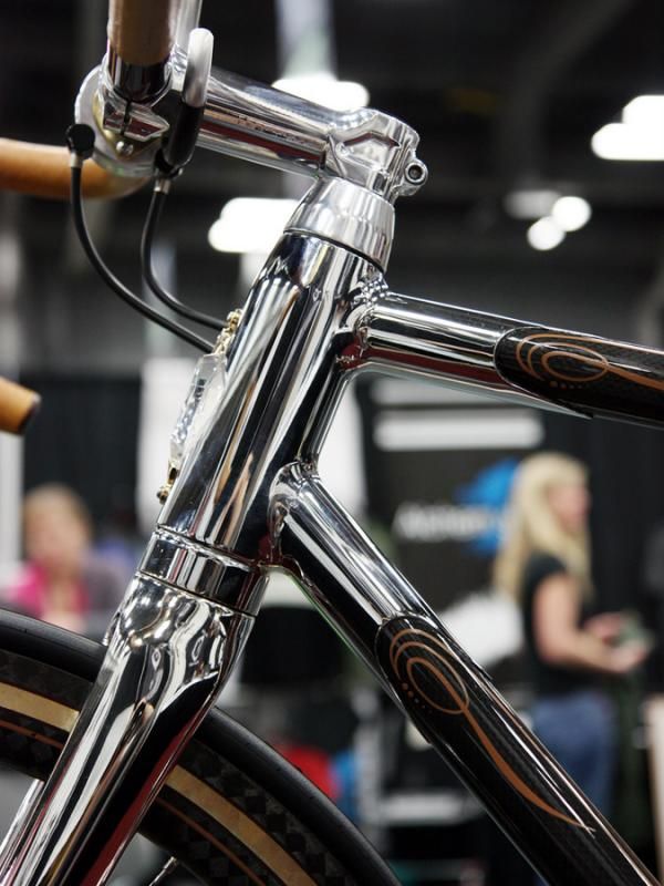 Krencker says its head tube badge is made of "Baccarat's crystal and precious metal". The Rohloff shifter lines are fed into the oversized head tube and run outside of the steerer tube.
