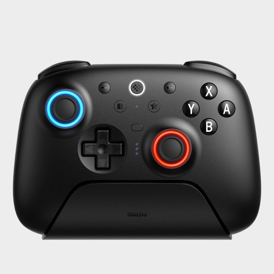 The 8BitDo Ultimate 2 in its charging dock on a plain background