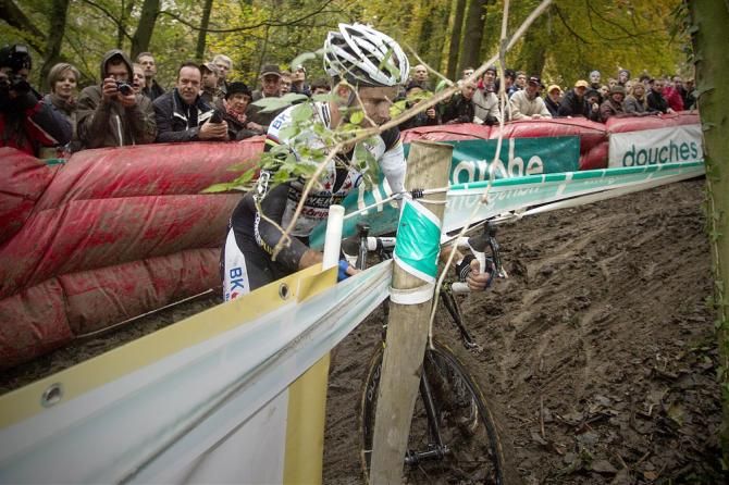 Niels Albert (BKCP-Powerplus) slid into a fence post on a tricky descent and lost contact with the leaders