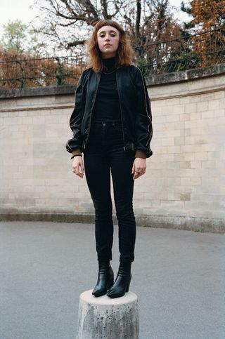Lucia Santina Ribisi in a black jacket