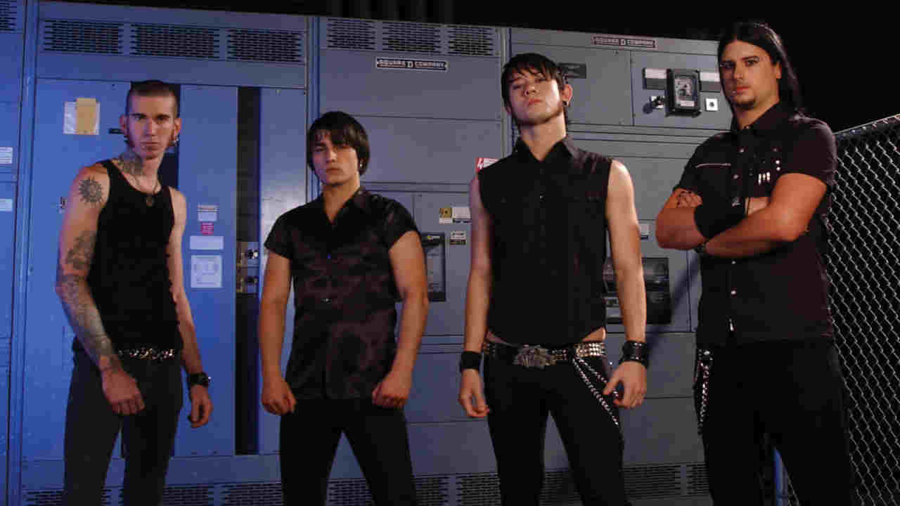 Trivium posing for a photograph in 2005