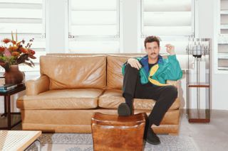 Planta Inc founder Guil Blanche sat in leather sofa looking towards the camera