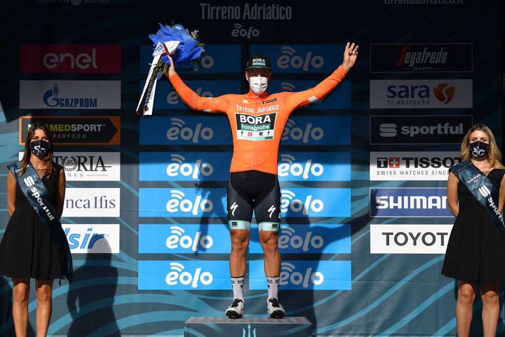 SARNANO ITALY SEPTEMBER 11 Podium Pascal Ackermann of Germany and Team BoraHansgrohe Orange Points Jersey Celebration Mask Covid safety measures during the 55th TirrenoAdriatico 2020 Stage 5 a 202km stage from Norcia to SarnanoSassotetto 1335m TirrenAdriatico on September 11 2020 in Sarnano Italy Photo by Justin SetterfieldGetty Images