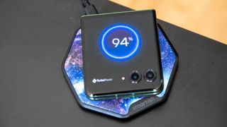 The Motorola Razr Plus 2024 charging wirelessly