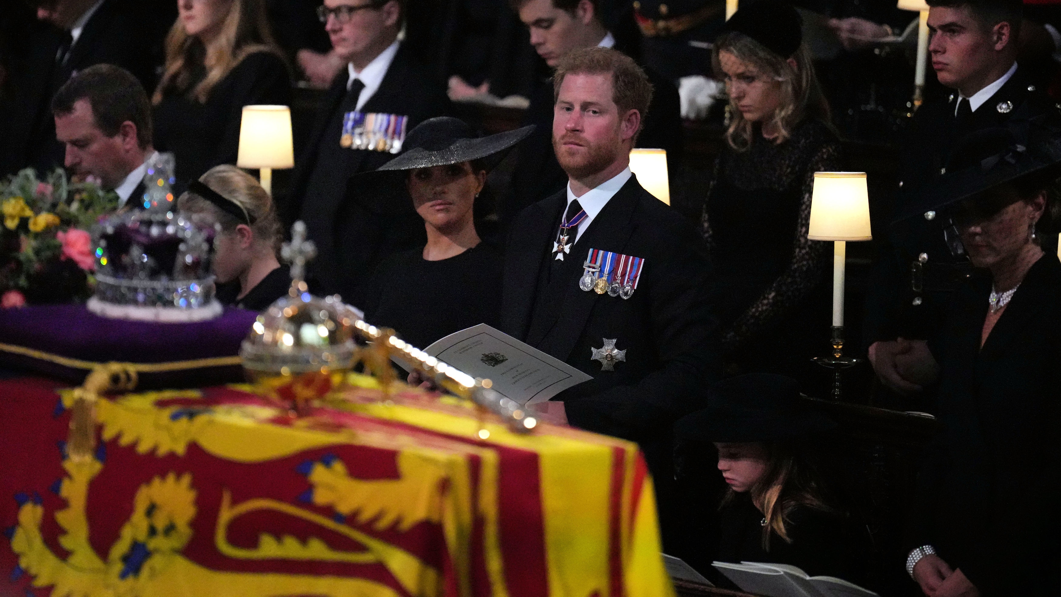 Prince Harry and Duchess Meghan look on during the Committal Service for Queen Elizabeth, at St George&#039;s Chapel in Windsor Castle on September 19, 2022