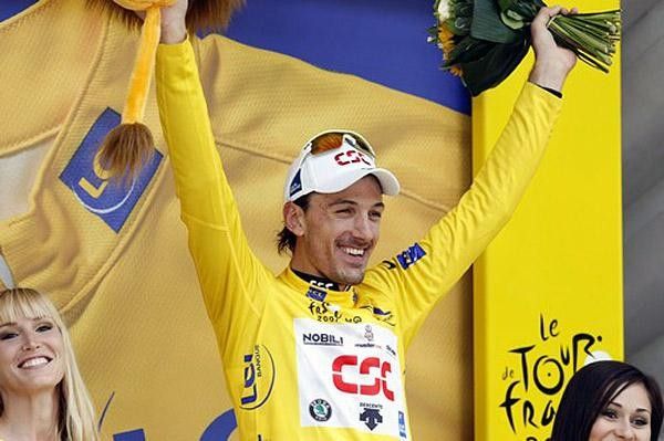 Cancellara in yellow, lion in hand.