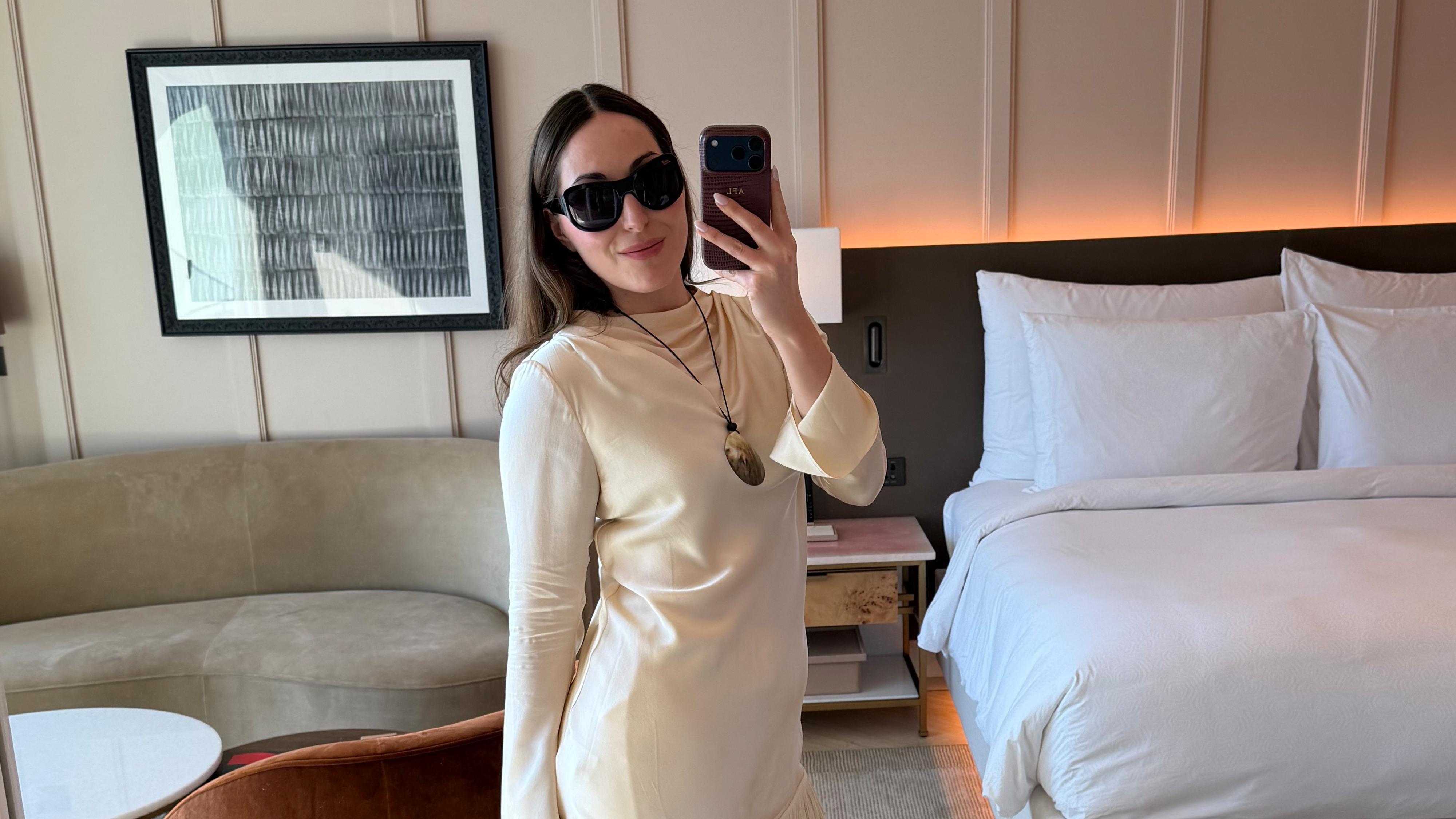 Who What Wear senior fashion editor Anna LaPlaca wearing a Doen silk fringe dress and pants