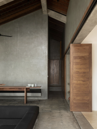 minimalism grey walls and wood finishes by Norm Architects