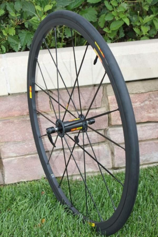 The Ksyrium SLR front wheel saves $200 over the R-Sys model, yet only adds about 30g to the overall weight of the set.