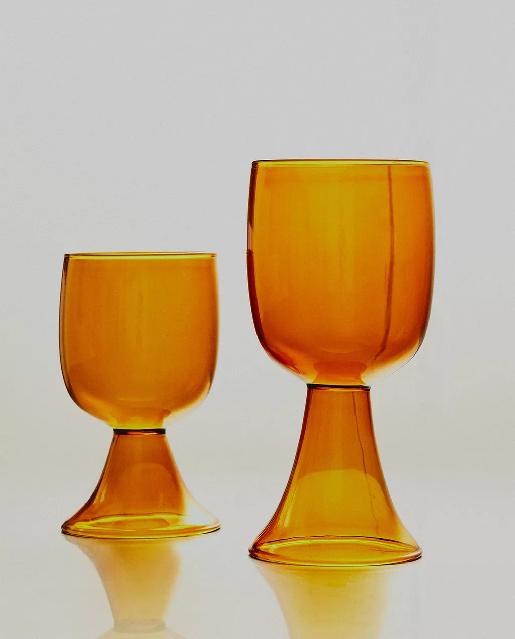 Orange glasses with wide stem
