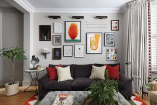 Living room with gallery wall above sofa