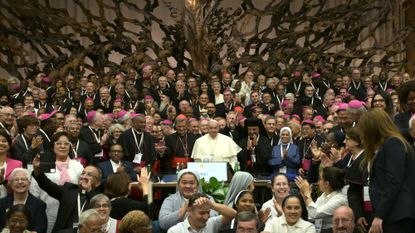 Pope Francis and delegates to synod of synodality document approval