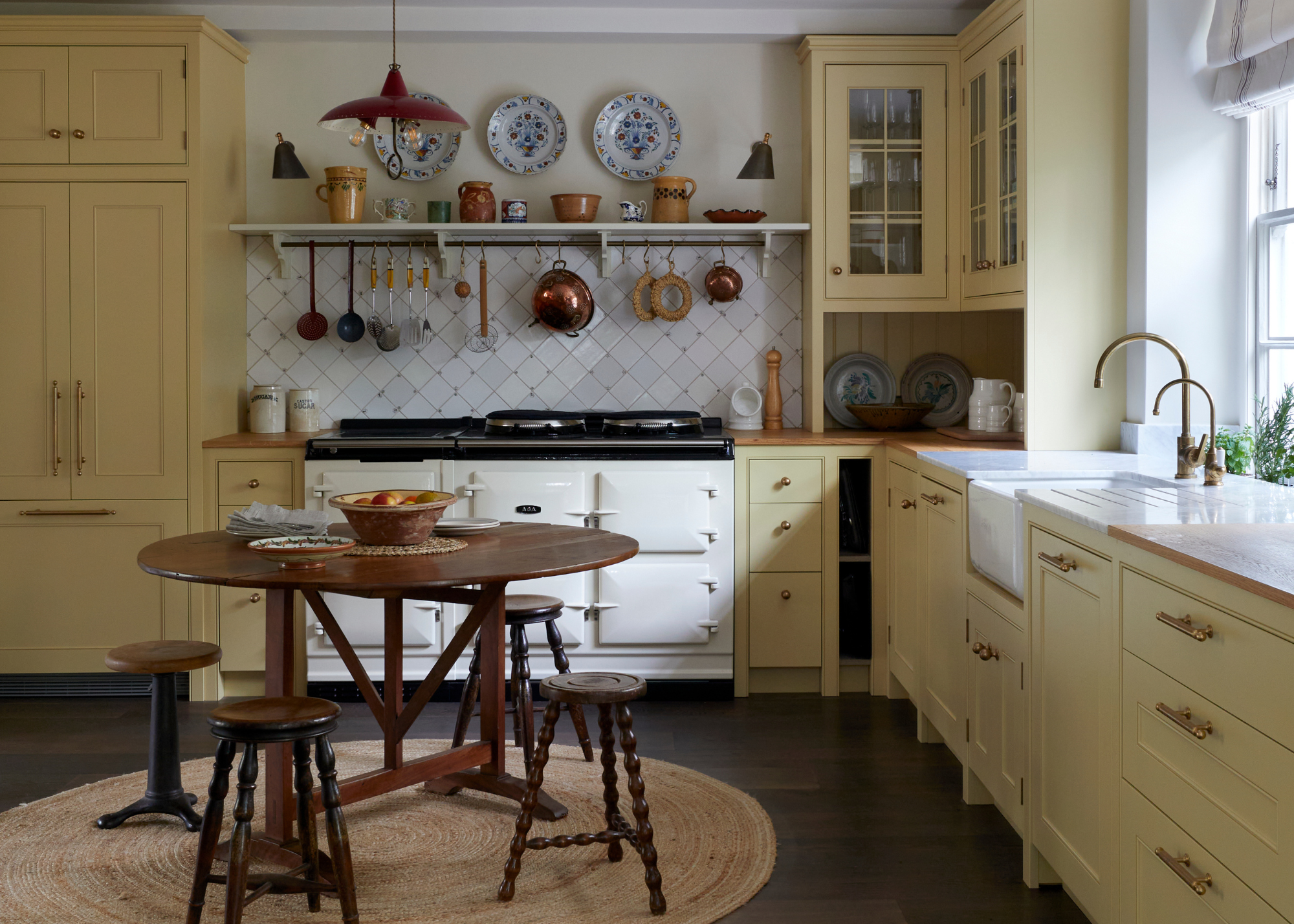 charming country-style kitchen with butter yellow cabinetry