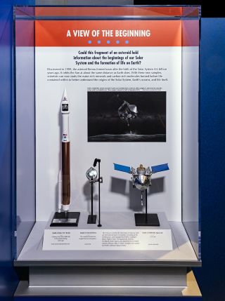 In addition to the Bennu sample, visitors to the Smithsonian's National Museum of National History in Washington, D.C. can also see scale models of the OSIRIS-REx spacecraft and the Atlas V 411 rocket that carried the spacecraft.