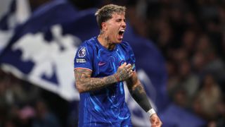 Enzo Fernandez of Chelsea celebrates scoring his sides first goal during the Premier League match between Chelsea FC and Tottenham Hotspur FC at Stamford Bridge on April 03, 2025 in London, England. 