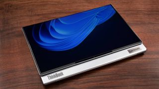 Lenovo ThinkBook Flip AI PC Concept in tablet mode on table