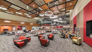 Collaboration is easy for Huntley High students, thanks to the multi-million-dollar Hub (a former gym). 