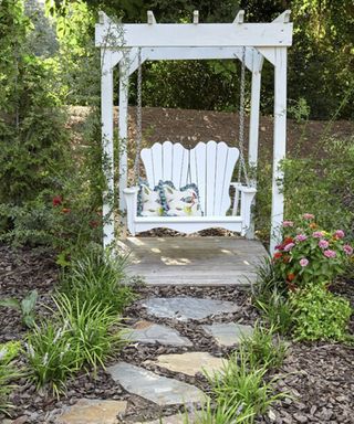Worden 2 Person Solid Wood Porch Swing in white by Red Barrel Studio, available at Wayfair