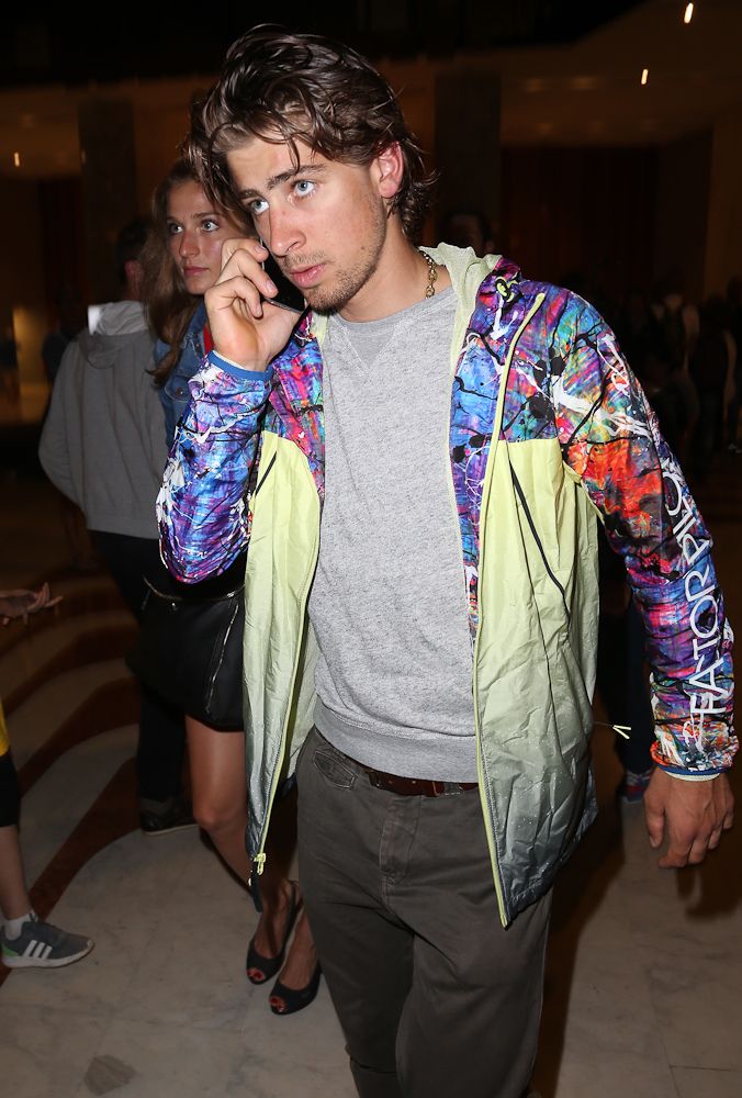Peter Sagan and his girlfriend Katarina Smolkova leave their hotel for the team's party following the 2015 Tour de France