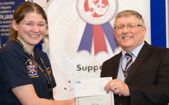 Grace Willsmer winner on the Tuesday receiving her prize from Mark Romain