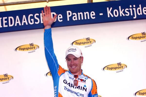 Tyler Farrar (Garmin-Transitions) waves from the podium.
