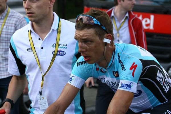 An injured Tony Martin (Omega Pharma-QuickStep) finishes stage 1 but heads straight for the bus