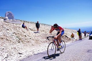 David Millar nods in respect to the Simpson Memorial on Mont Ventoux during the 2000 Dauphine Libere