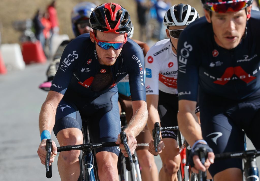 Team Ineos rider Great Britains Tao Geoghegan Hart L rides with Team Sunweb rider Australias Jai Hindley C behind Team Ineos rider Australias Rohan Dennis R during the 20th stage of the Giro dItalia 2020 cycling race a 198kilometer route between Alba and Sestriere on October 24 2020 Photo by Luca Bettini AFP Photo by LUCA BETTINIAFP via Getty Images