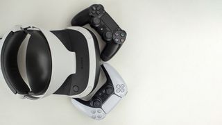 An original PSVR with PS4 and PS5 controllers
