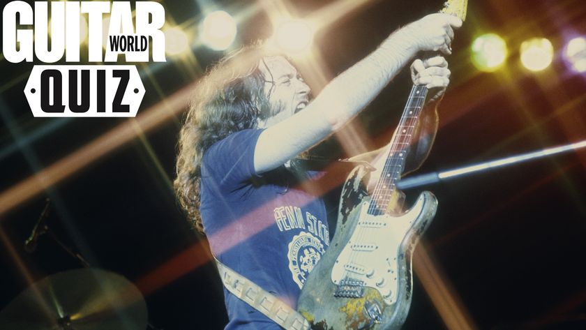Rory Gallagher performs onstage in London in 1975