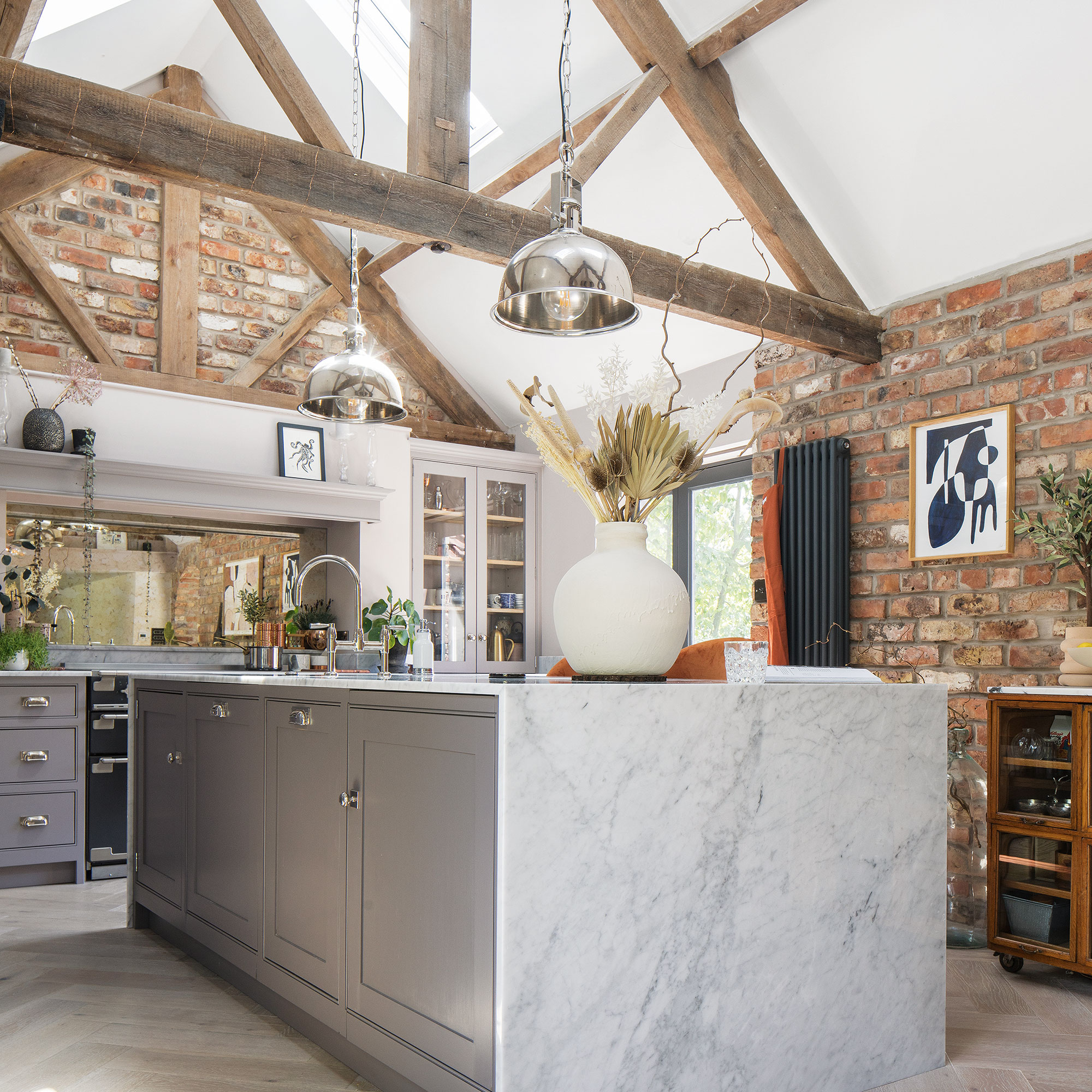 kitchen with hanging light and cabinet