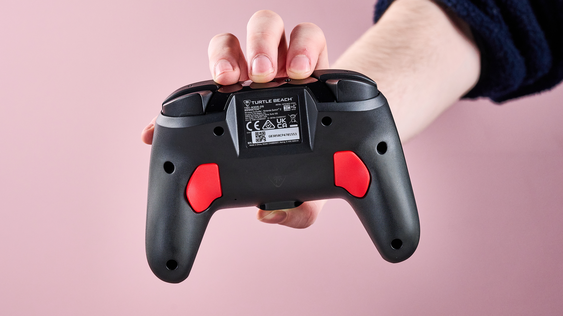 Man holding the Turtle Beach Rematch Wireless Controller for Nintendo Switch 2