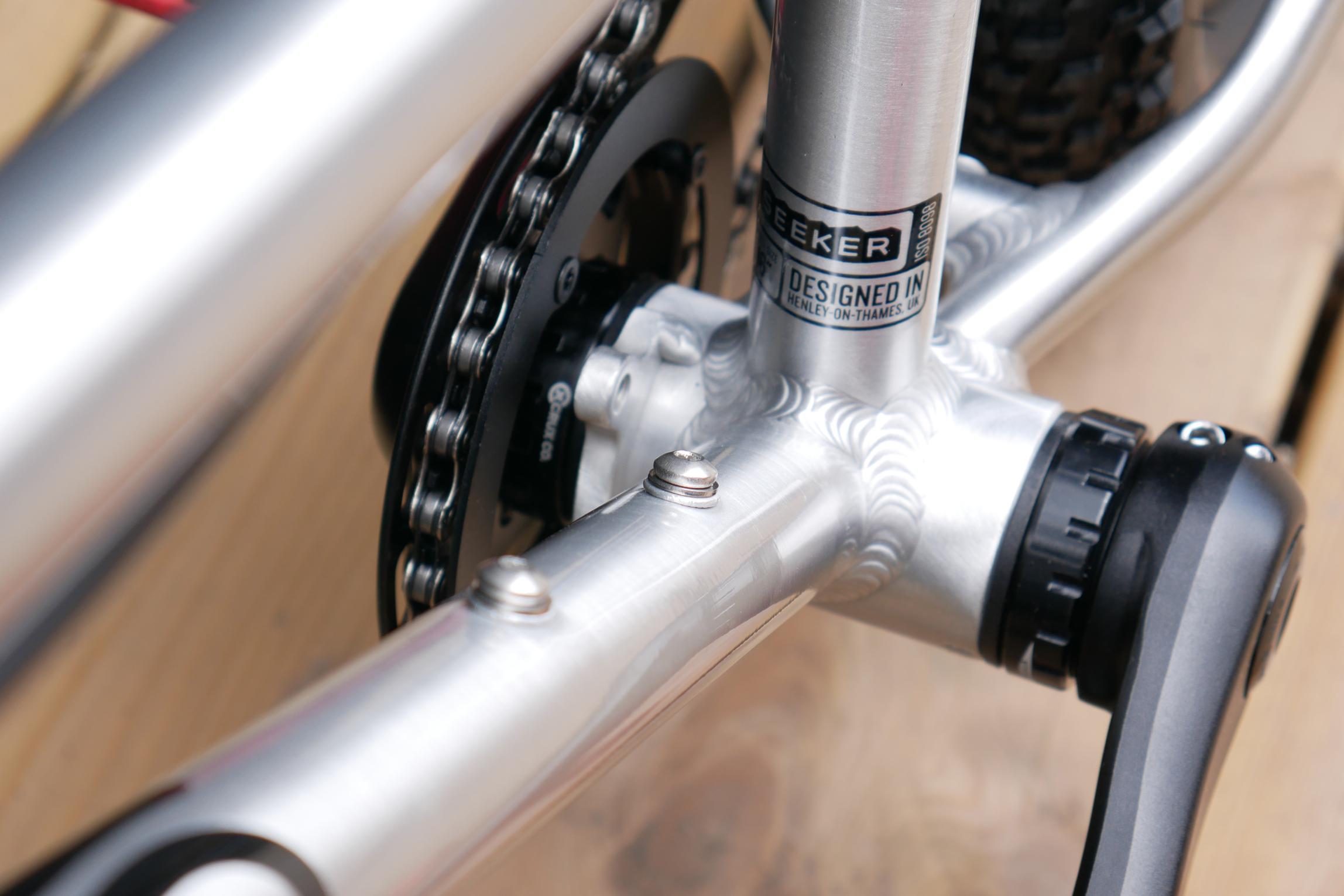 detailed look at the external bottom bracket, welds around this area and the bottle cage bosses on the Early Rider Seeker 16