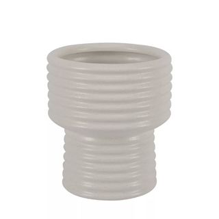 ribbed ceramic vase in cylindrical shape with narrower lower half