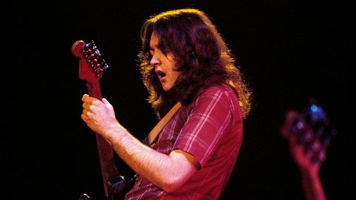 Irish blues guitarist Rory Gallagher performs at the Omni Coliseum on February 8, 1976 in Atlanta, Georgia.