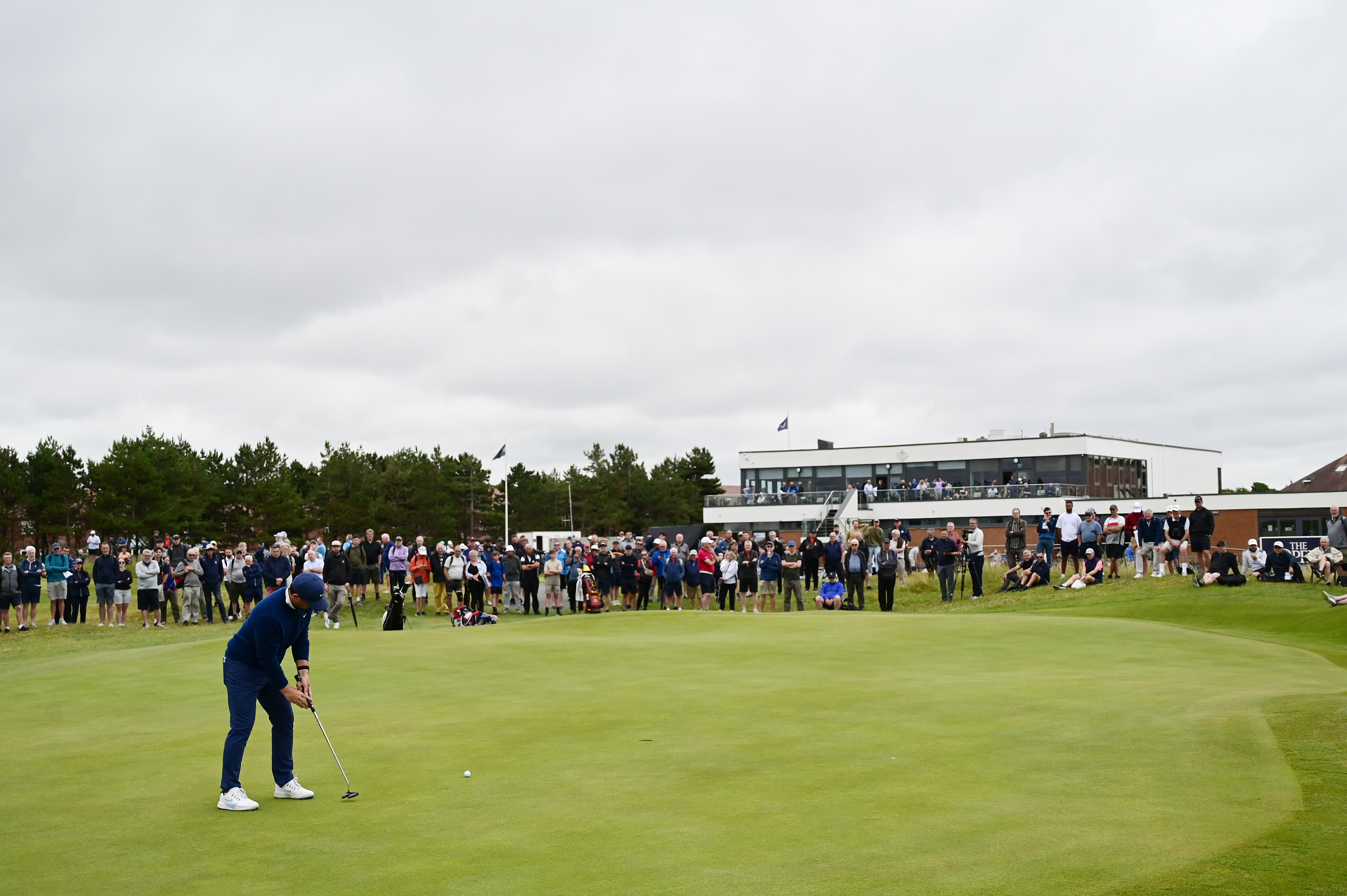 Alex Fitzpatrick putts on the 18th green of West Lancashire Golf Club during round one of Open Championship Final Qualifying 2025