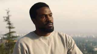 Simon Williams looking at an off-camera Trevor Slattery in Marvel's Wonder Man