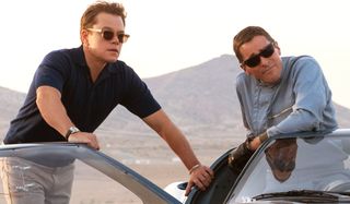 Ford v Ferrari Matt Damon and Christian Bale perched on a race car