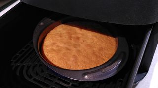 Cake baked using air fryer inside drawer