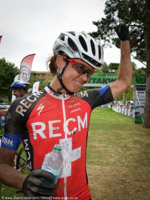Swiss marathon national champion, Ariane Kleinhans of Team RE:CM acknowledges the crowd's appreciation after winning her fourth consecutive Attakwas Extreme marathon on Saturday.