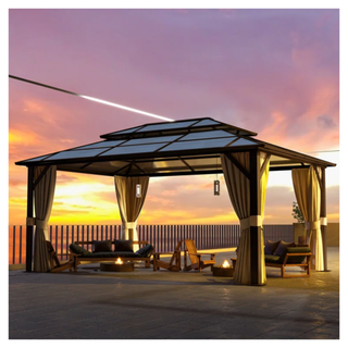 An aluminium patio pergola with curtains