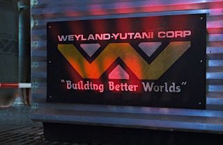 A company sign promoting the Weyland-Yutani Corp