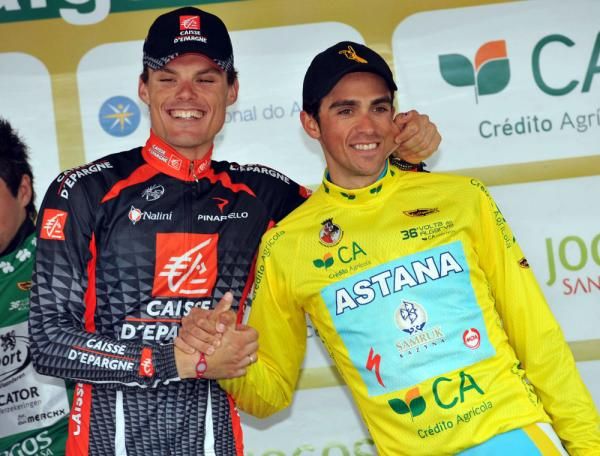 Who's a good little time triallist? Luis Leon Sanchez (Caisse d'Epargne) pinches the cheek of Alberto Contador (Astana) on the podium